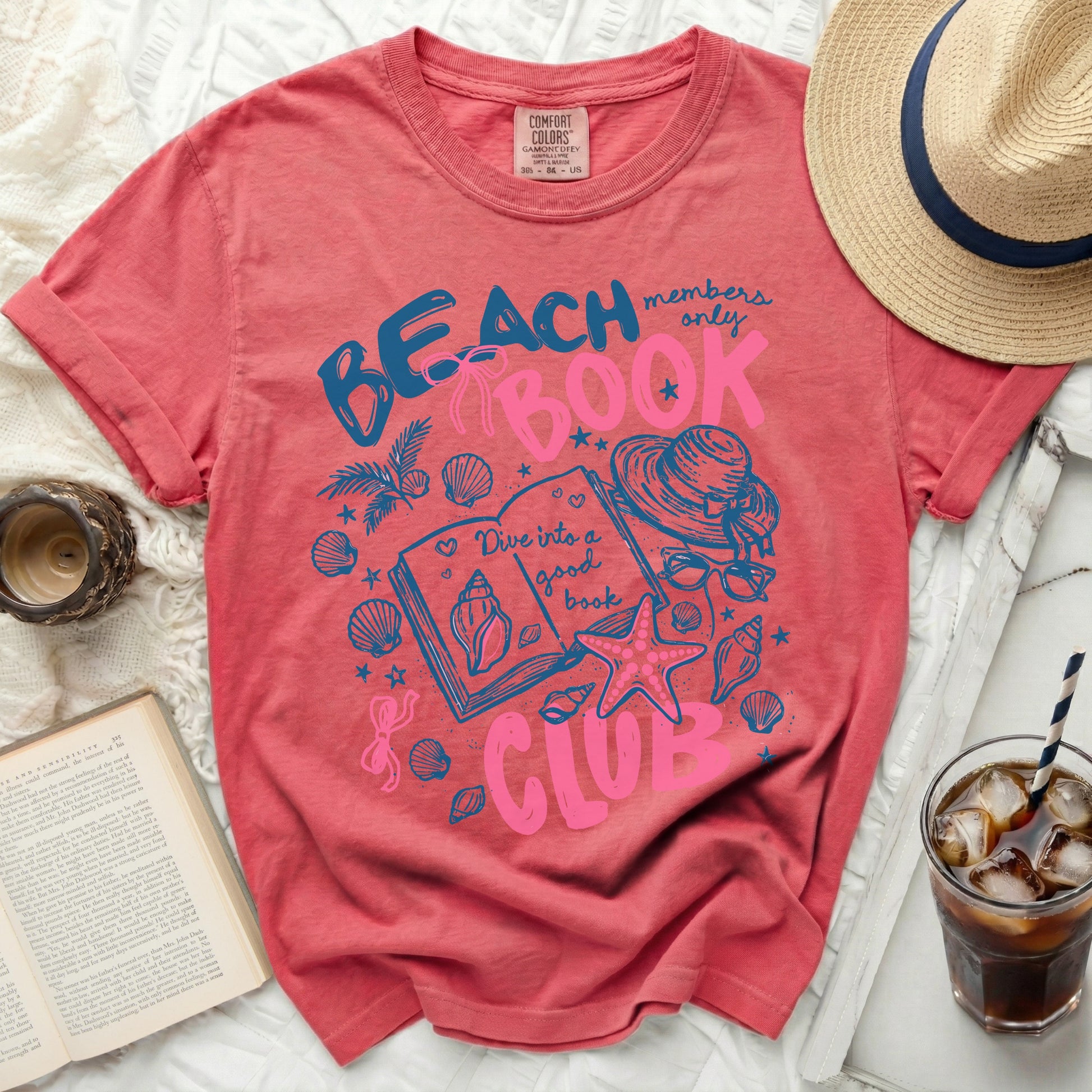Coral t-shirt with "Beach Members Only Book Club" graphic.