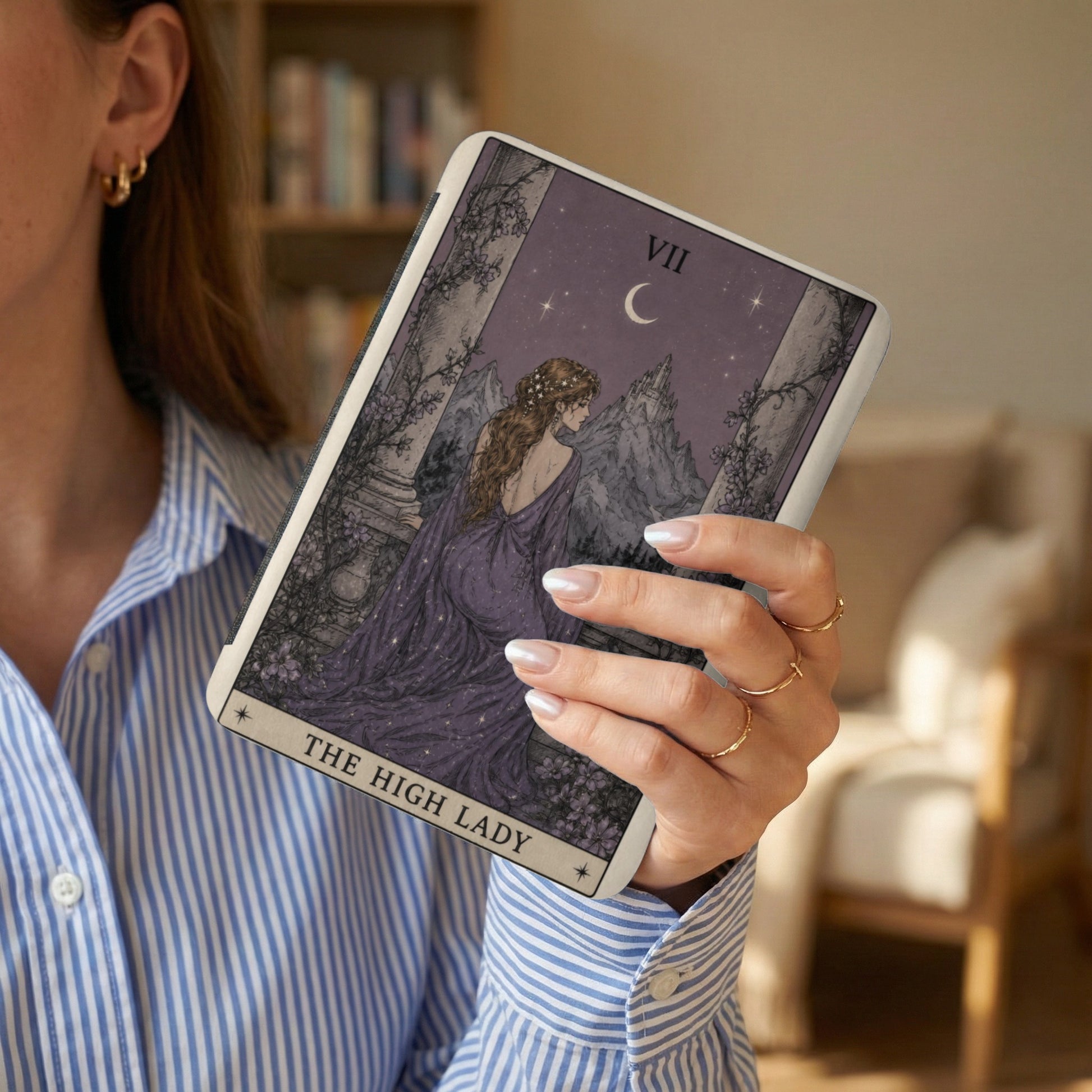 Tarot card featuring "The High Lady" with a woman in a purple dress against a starry sky.