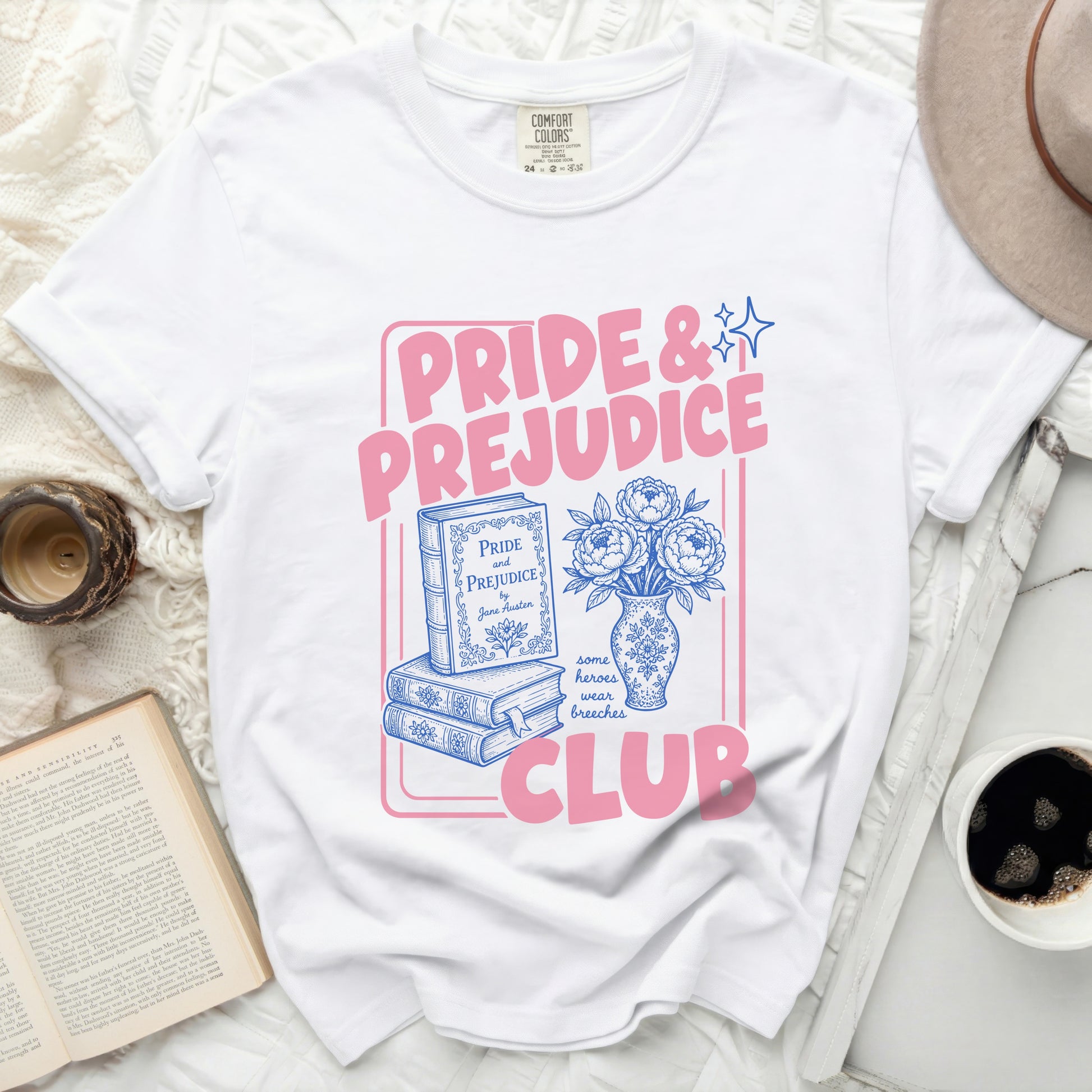 White t-shirt with Pride and Prejudice Club graphic and book illustration.