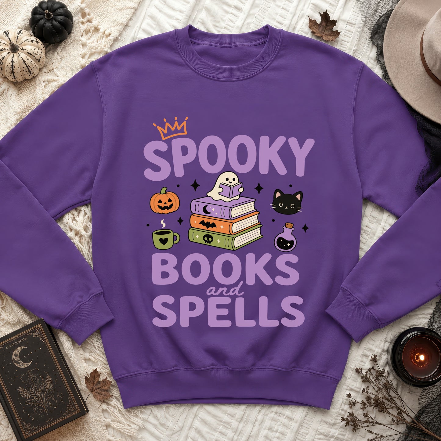Purple sweatshirt with "Spooky Books and Spells" Halloween graphic.