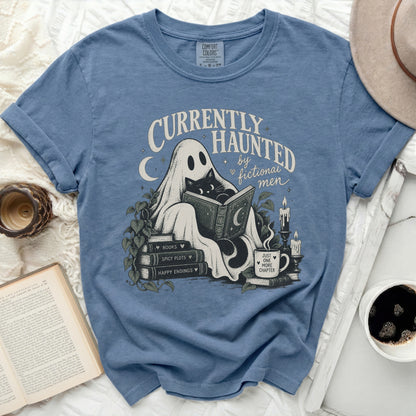 Ghost in sheet reading with cat, text "Currently Haunted by Fictional Men".
