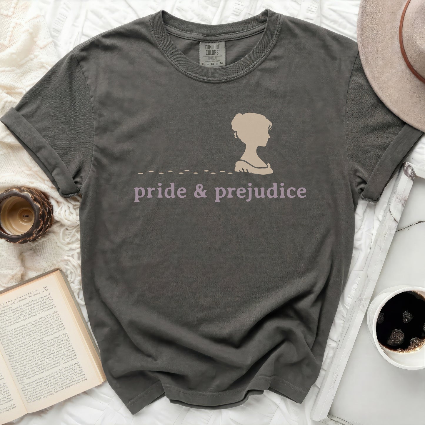 Comfort Colors t-shirt with "Pride & Prejudice" text and silhouette of a woman.