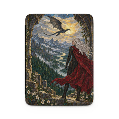 Stained glass art of a woman in red cape and armor overlooking a fantasy valley with a castle and dragon.