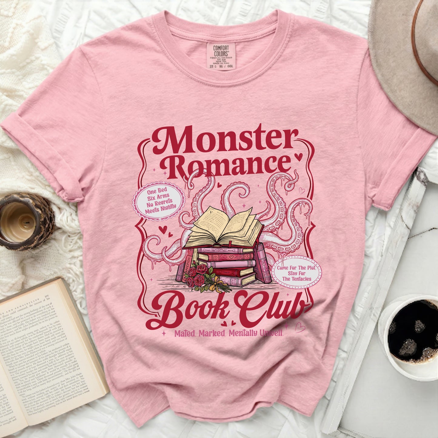 Pink t-shirt with "Monster Romance Book Club" design and tentacles.