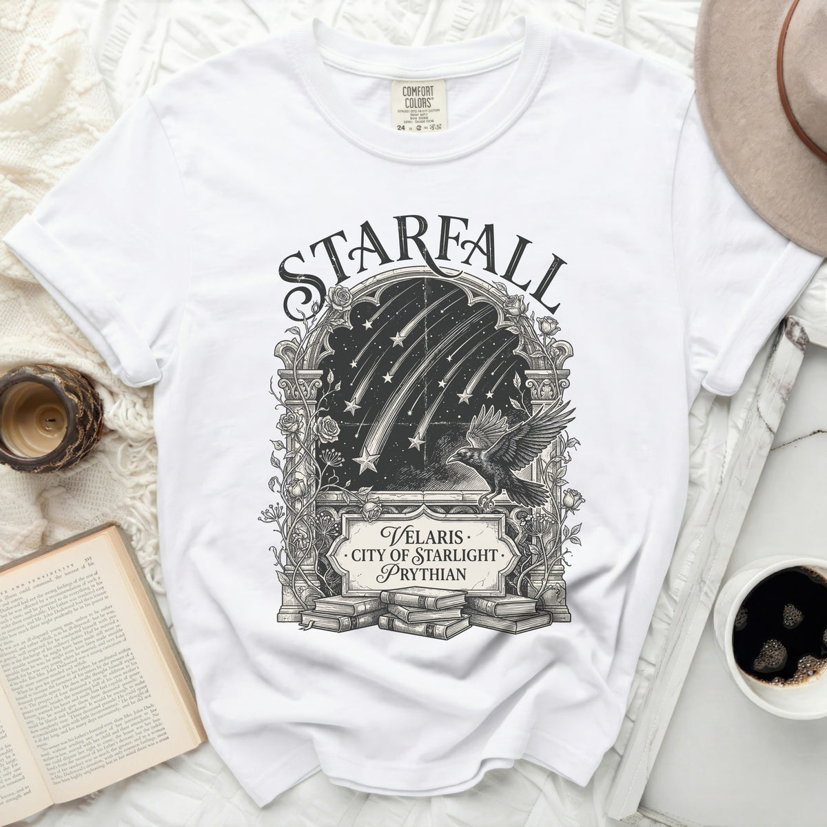 White t-shirt with "STARFALL VELARIS CITY OF STARLIGHT PRYTHIAN" graphic.