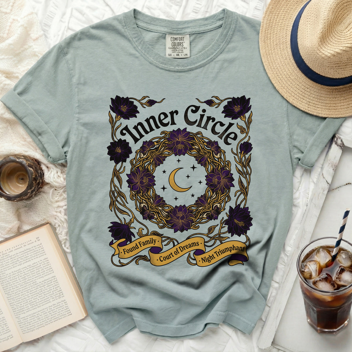 Light blue t-shirt with "Inner Circle" and floral wreath graphic, "Found Family Court of Dreams Night Triumphant".