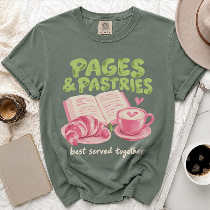 Green t-shirt with "PAGES & PASTRIES best served together" text and graphic.