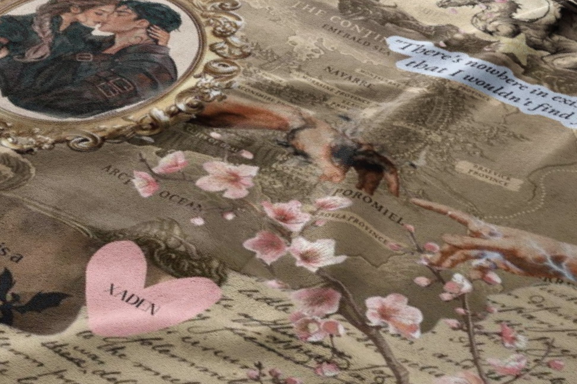 Collage fabric with couple kissing, map elements, flowers, and text "XADEN".