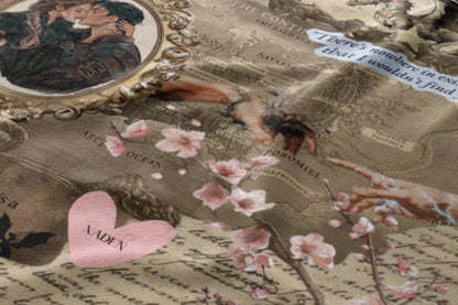 Collage fabric with couple kissing, map elements, flowers, and text "XADEN".
