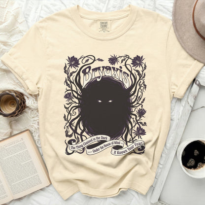 Bryaxis graphic t-shirt with floral and dark entity design.
