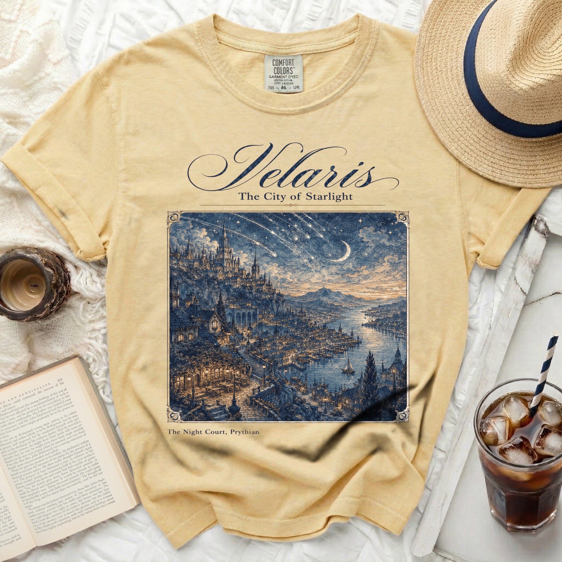 Velaris The City of Starlight artwork on a yellow t-shirt.