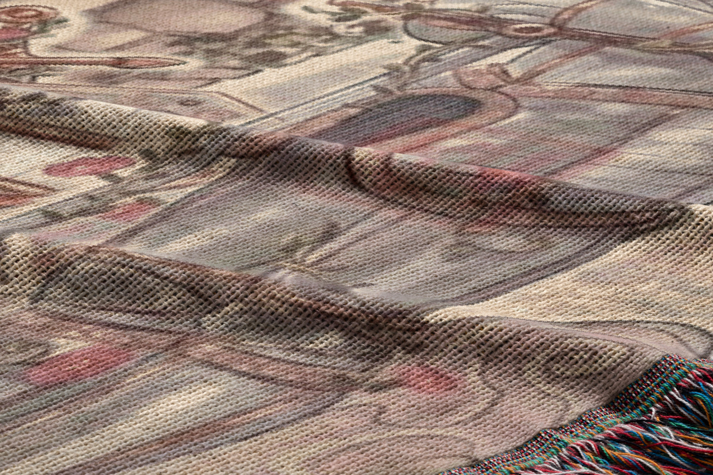 The image is a close-up of a fabric with a floral pattern, featuring a mix of pink, green, and brown colors.