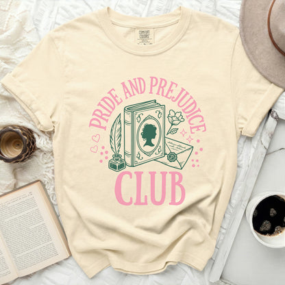 Cream t-shirt with "Pride and Prejudice Club" graphic featuring a book, quill, and envelope.