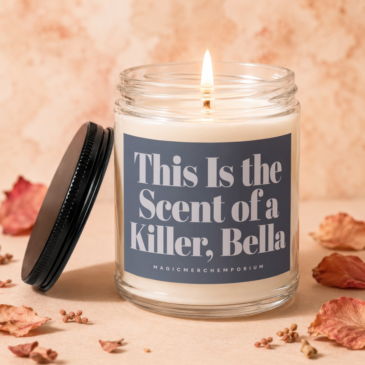 Scented candle with text "This is the Scent of a Killer, Bella".
