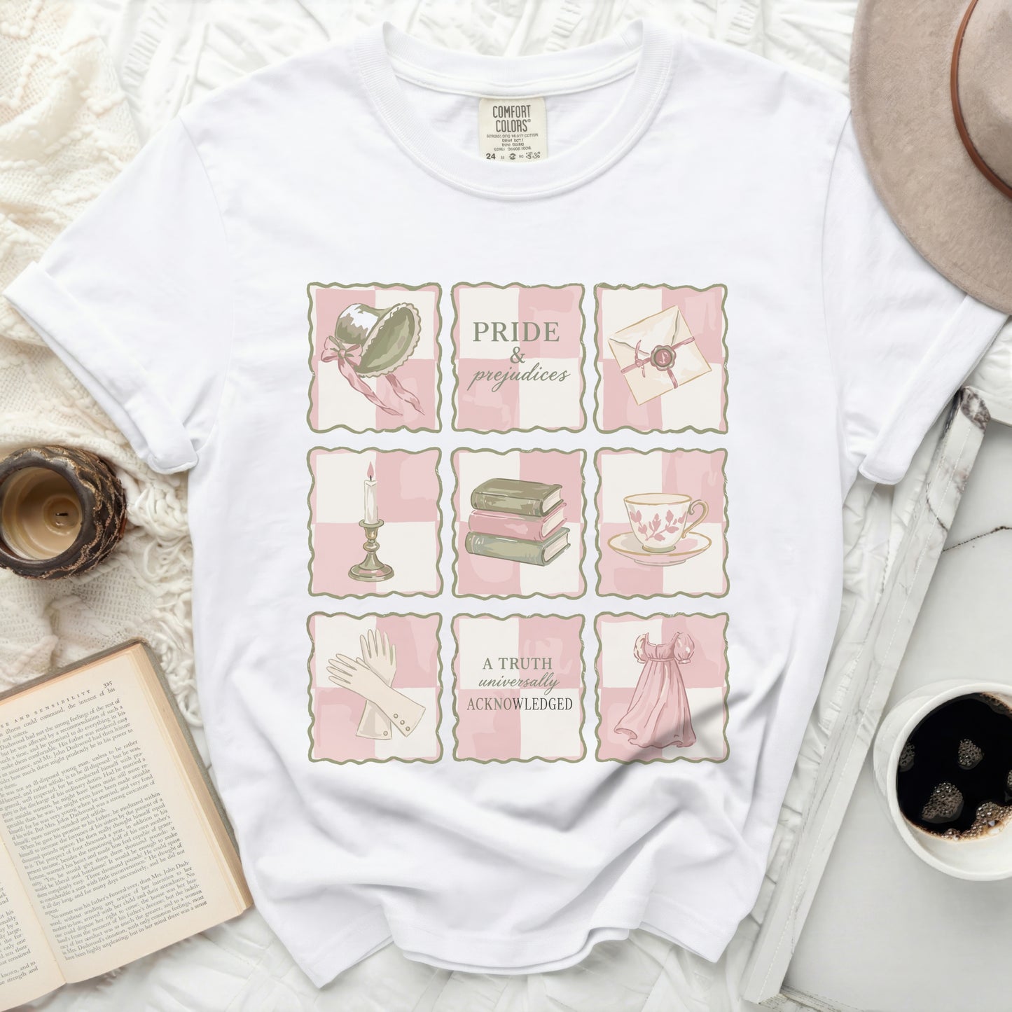 White t-shirt with a grid of nine illustrations and "Pride & Prejudices" text.
