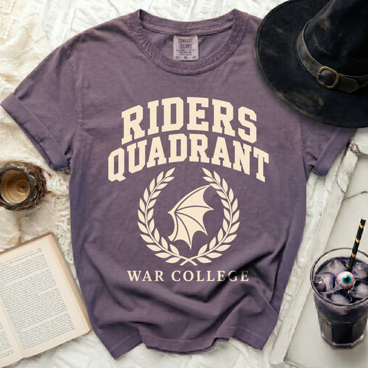 Purple t-shirt with "RIDERS QUADRANT WAR COLLEGE" text and winged emblem.