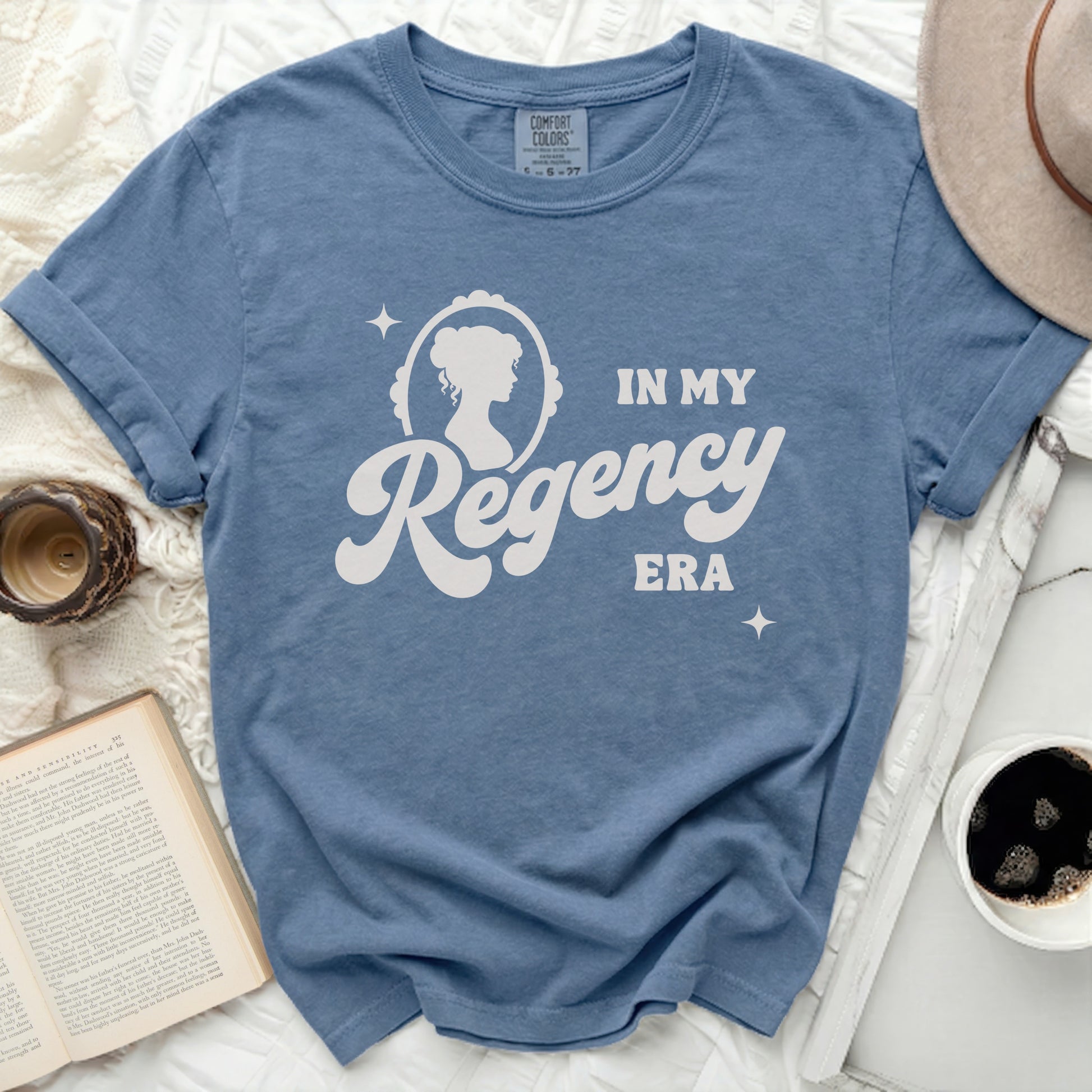 Blue Comfort Colors t-shirt with "In My Regency Era" graphic.