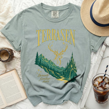 Green t-shirt with "TERRASEN" and a deer, mountains, and castle graphic.