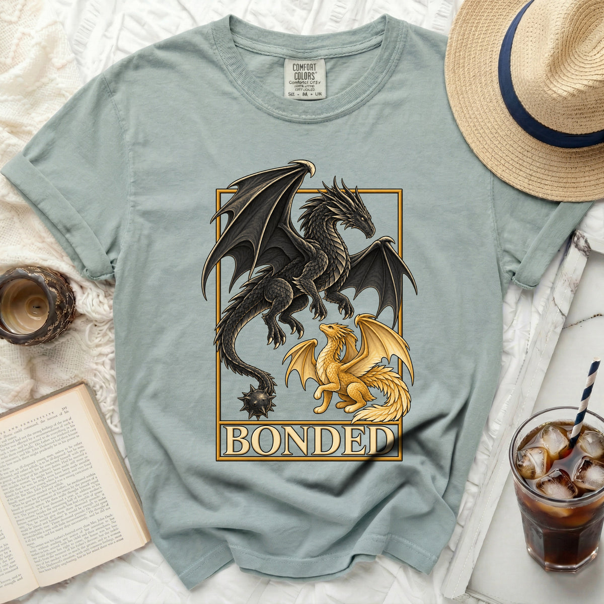 T-shirt with black and gold dragons design and "BONDED" text.