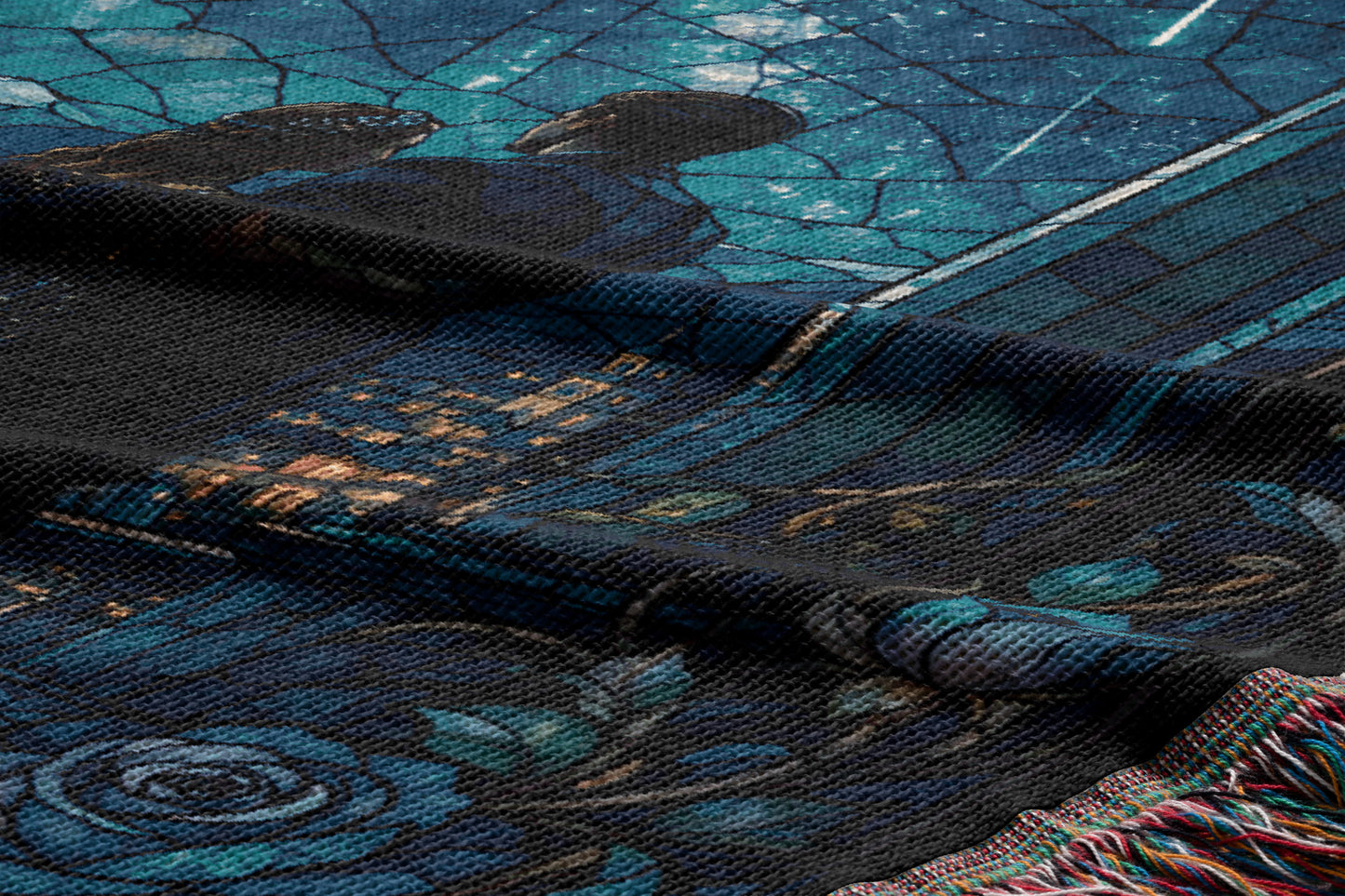 a close-up view of a textured fabric with a floral pattern, including a rose design. The fabric appears to be a dark-colored material with a blue and green color scheme.