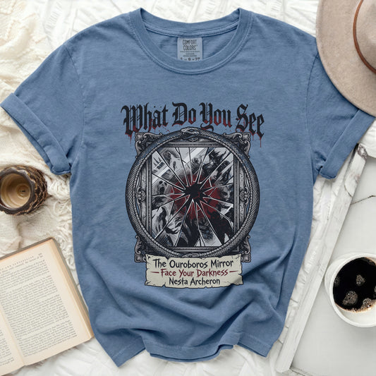 Blue t-shirt with "What Do You See The Ouroboros Mirror Face Your Darkness Nesta Archeron" graphic.