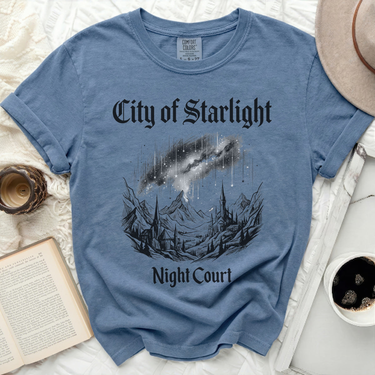 Blue t-shirt with "City of Starlight Night Court" and galaxy illustration.