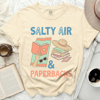T-shirt with "Salty Air & Paperbacks" text and book illustration.