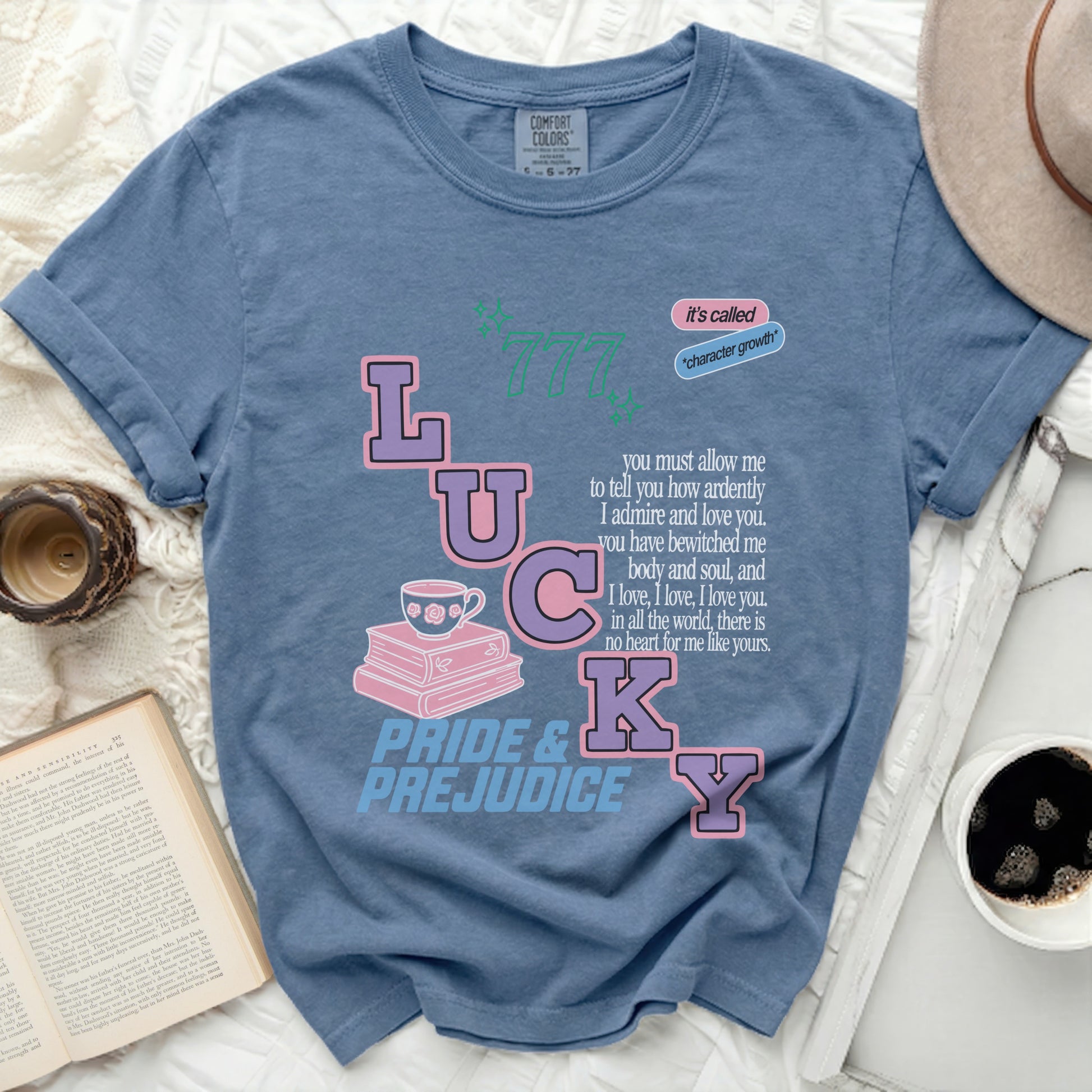 Comfort Colors blue t-shirt with "LUCKY" and Pride & Prejudice quote.