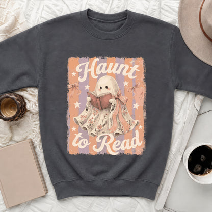 Dark grey sweatshirt with a graphic of a ghost reading a book and the text "Haunt to Read".