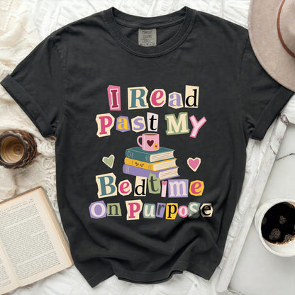 Black t-shirt with "I Read Past My Bedtime On Purpose" graphic.