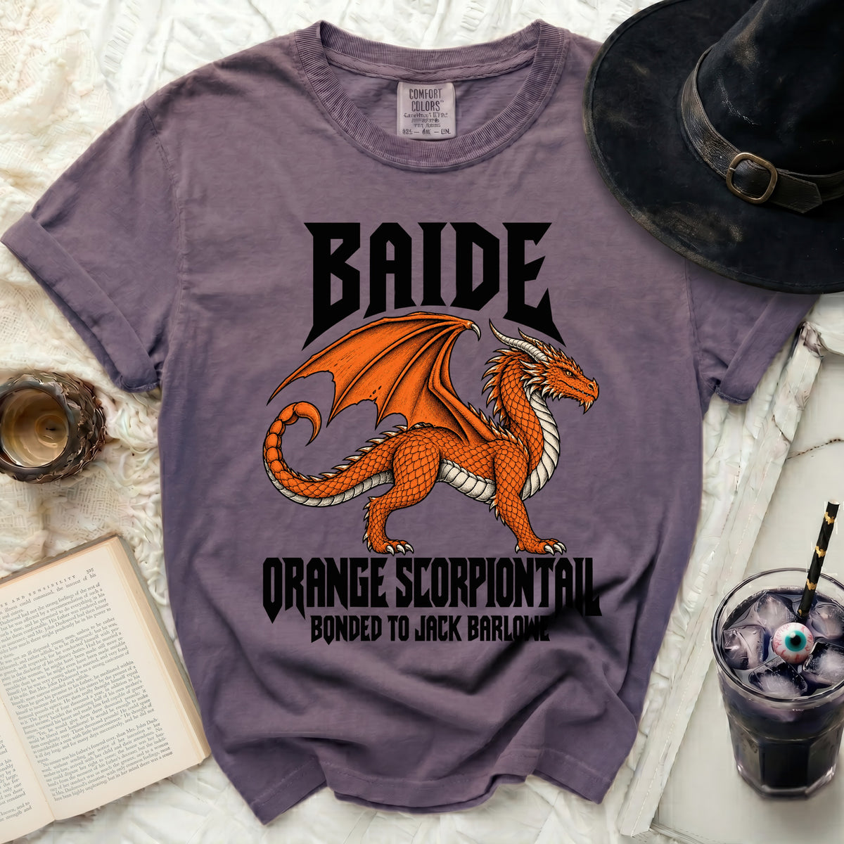 Purple t-shirt with orange dragon graphic and text "BAIDE" and "ORANGE SCORPIONTAIL".