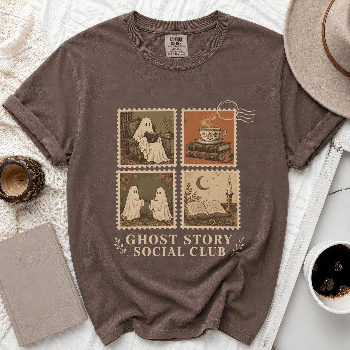 Brown t-shirt with ghost and book motifs and "Ghost Story Social Club" text.