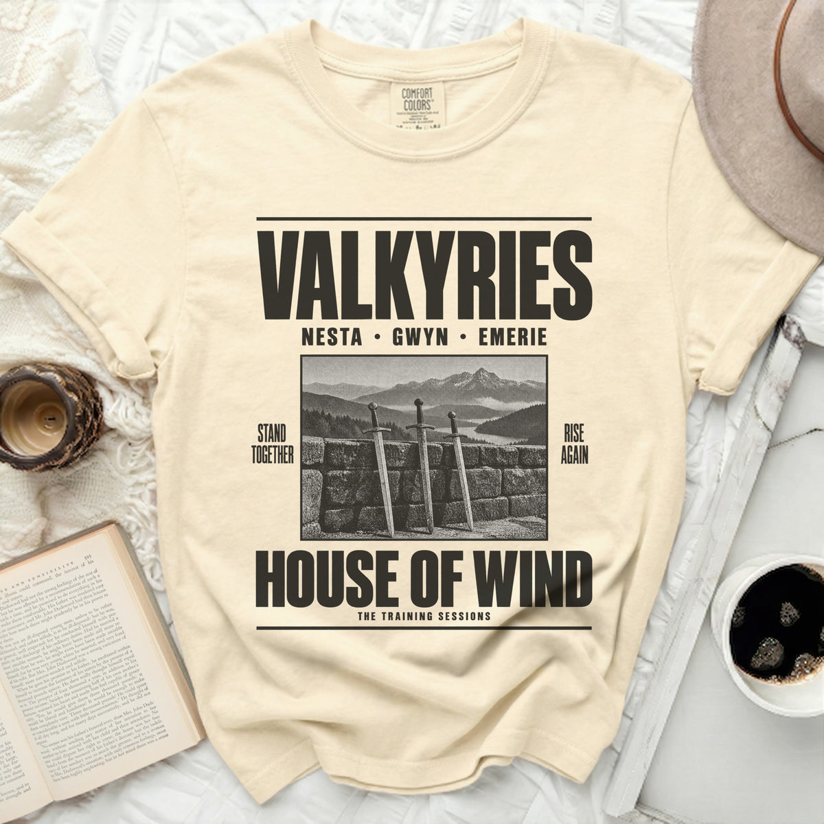 Cream t-shirt with "Valkyries House of Wind" graphic featuring swords and mountains.
