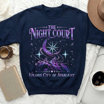 Navy sweatshirt with "The Night Court Velaris City of Starlight" text and celestial design.
