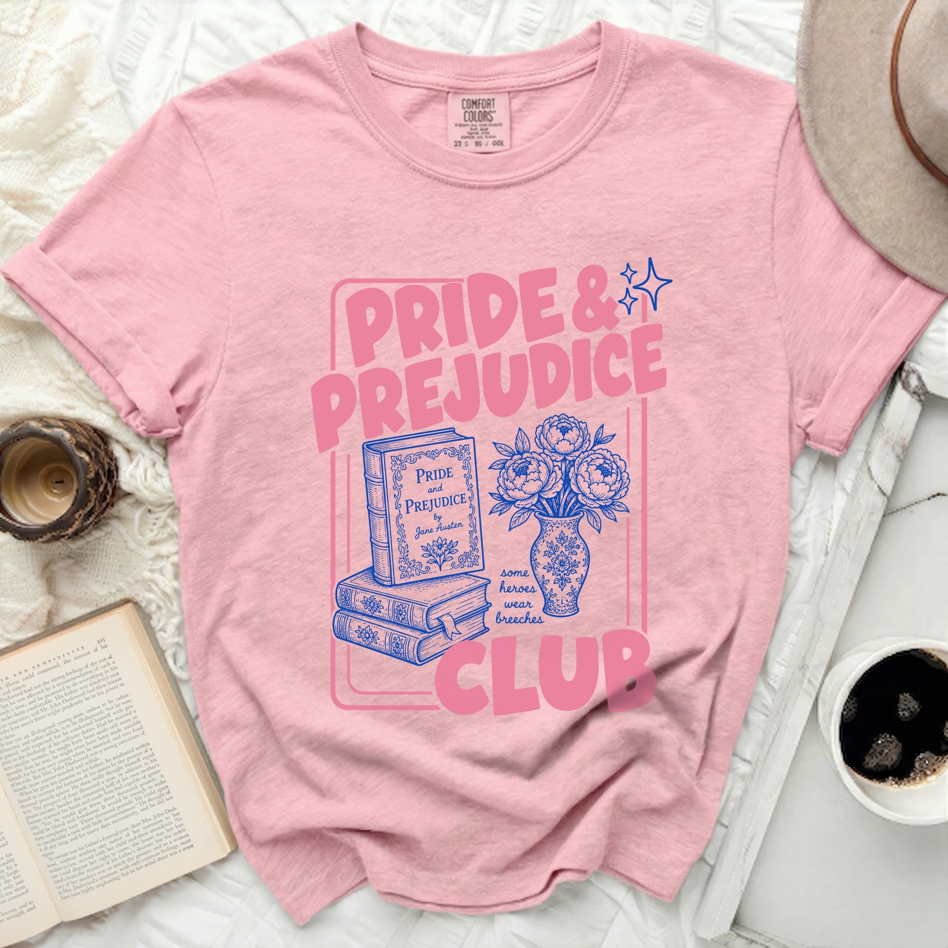 Pink t-shirt with "Pride & Prejudice" book club graphic.