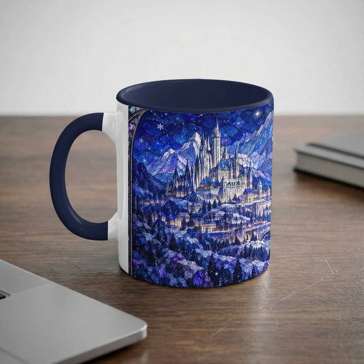 A white ceramic mug with a dark blue handle and rim, featuring a blue stained-glass castle illustration.