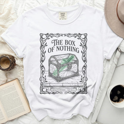 White t-shirt with "The Box of Nothing" title and cracked glass box graphic.