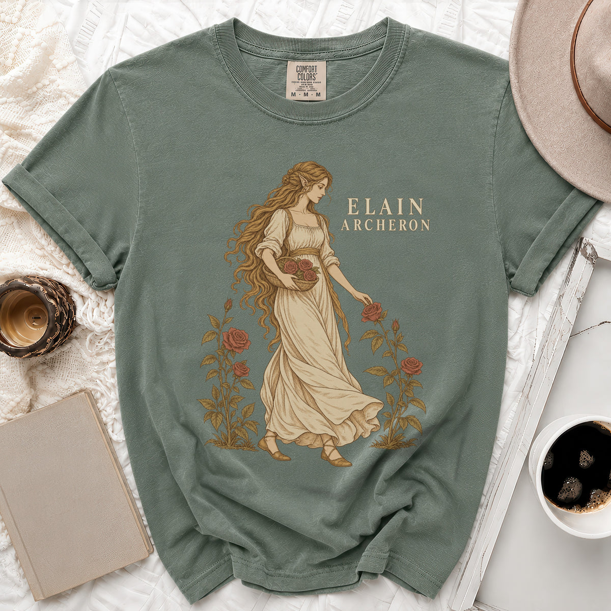 Sage green Comfort Colors t-shirt with an Elain Archeron graphic of a woman with roses.
