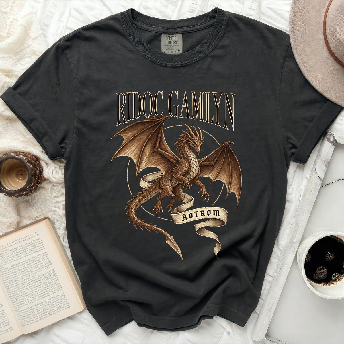 Dark t-shirt with a brown dragon graphic and text "RIDOC GAMIYN AOTROM".