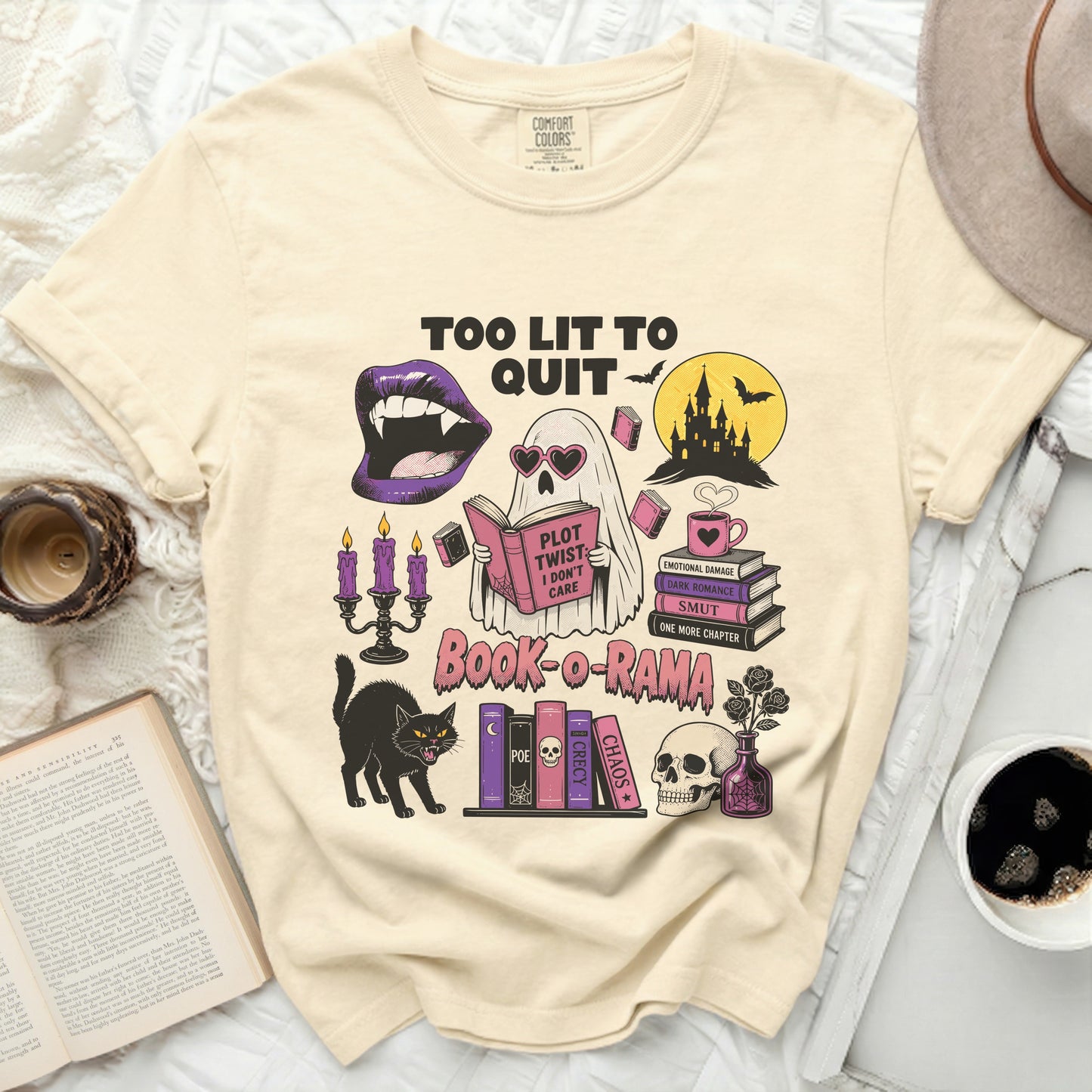 T-shirt with ghost reading a book, vampires, skulls, black cat, and books.