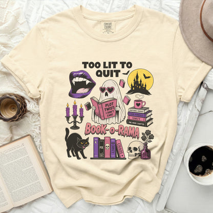T-shirt with ghost reading a book, vampires, skulls, black cat, and books.