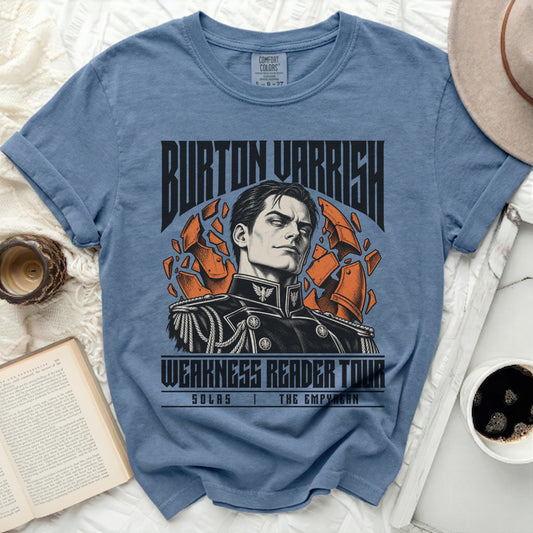 Blue t-shirt with a graphic of a man and text "Burton Varrish Weakness Reader Tour".