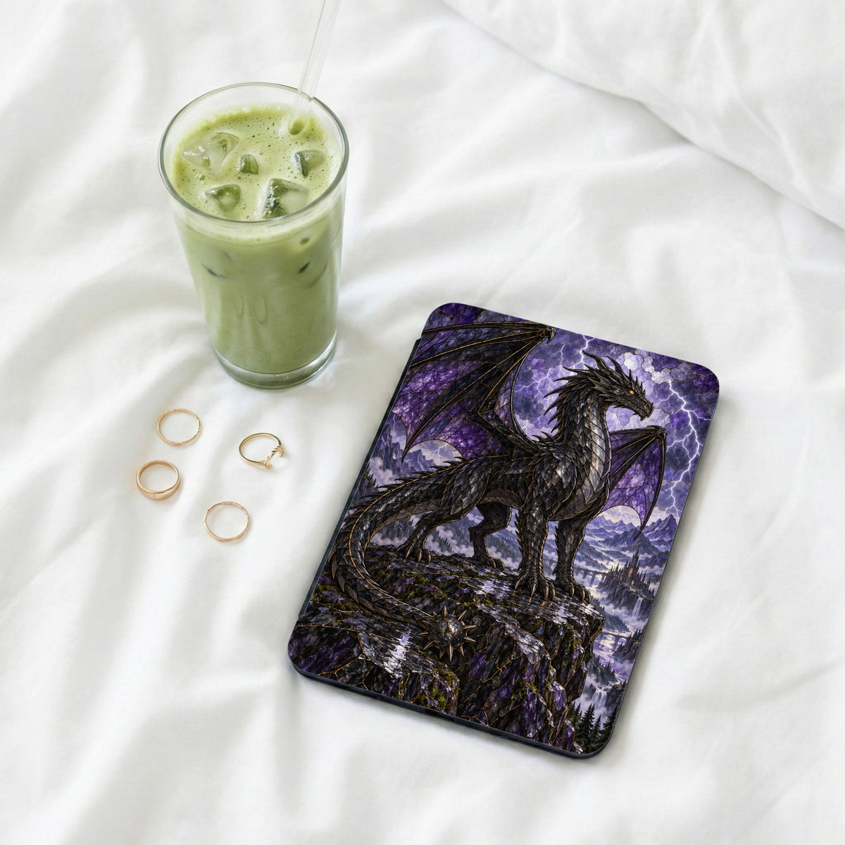 Tablet case featuring a black dragon on a cliff with a castle and lightning background.