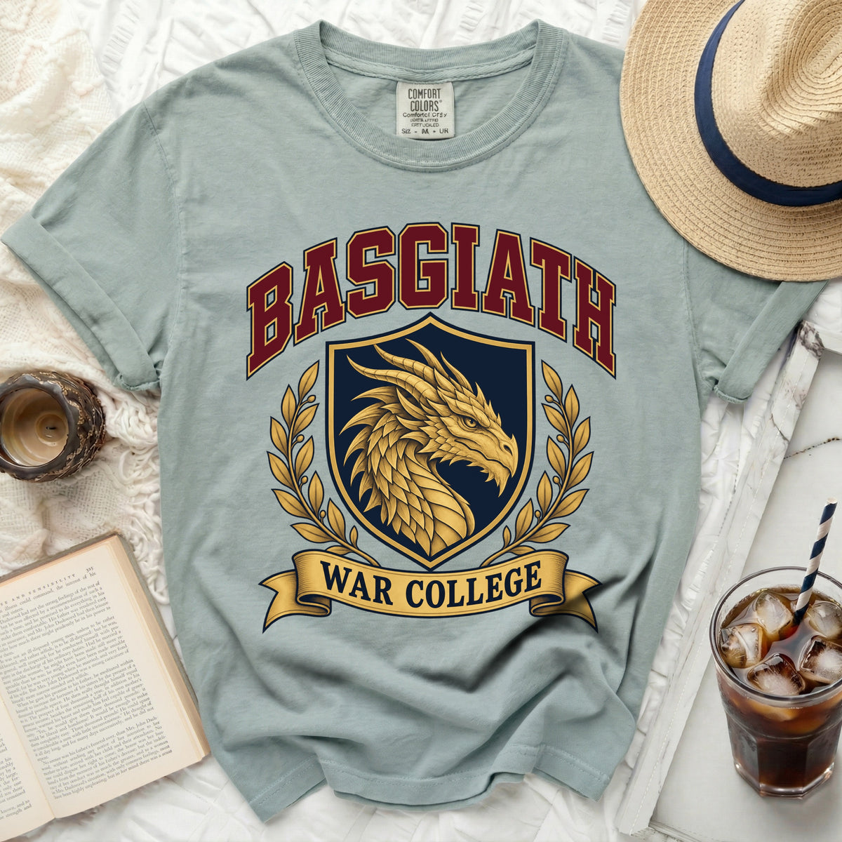 Pale blue t-shirt with BASGIATH WAR COLLEGE dragon crest graphic.