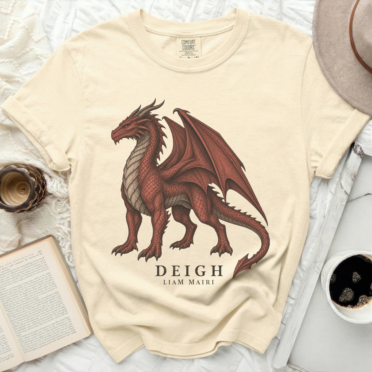 Cream t-shirt with red dragon graphic and text "DEIGH LIAM MAIRI".
