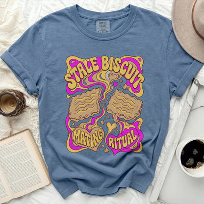 Stale Biscuit Mating Ritual graphic on a blue t-shirt.
