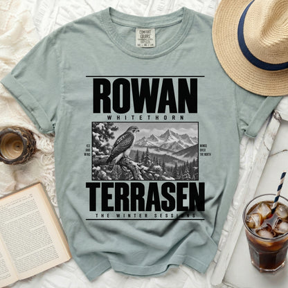 Light blue t-shirt with "ROWAN WHITETHORN TERRASEN THE WINTER SESSIONS" text.