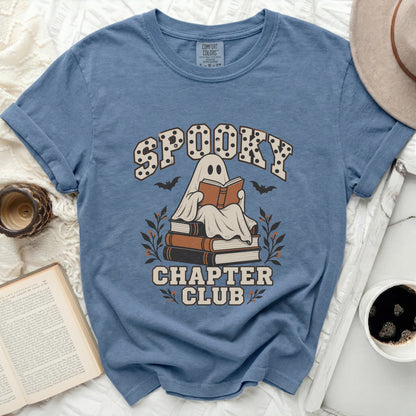 Blue t-shirt with "Spooky Chapter Club" text and a ghost reading a book.