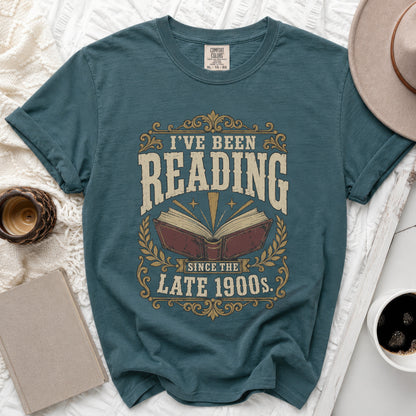 Teal t-shirt with "I've Been Reading Since the Late 1900s" graphic.