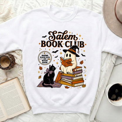 Salem Book Club ghost, cat, and books Halloween graphic on white sweatshirt.
